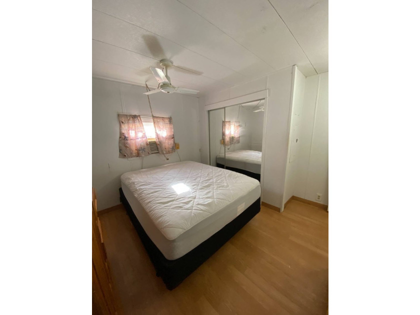 This home offers an open floor plan, furniture included, bead - photo 11