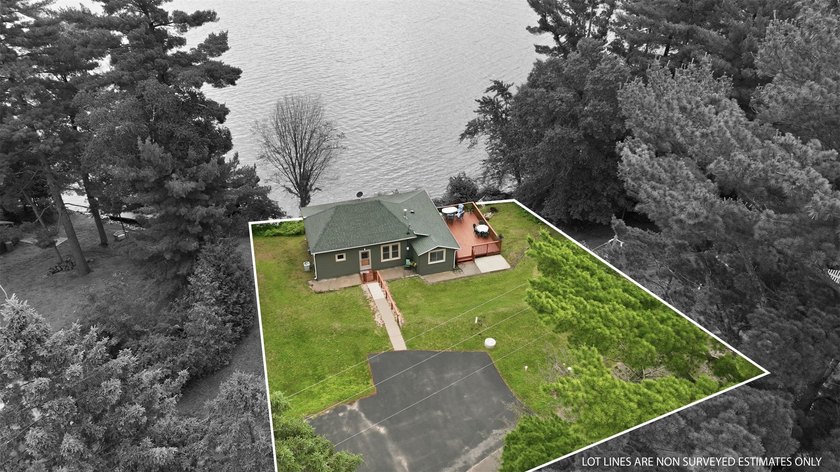 Enjoy front-row lake living on the Chetek Chain at this inviting - photo 6