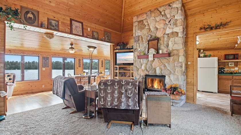 Enjoy front-row lake living on the Chetek Chain at this inviting - photo 9