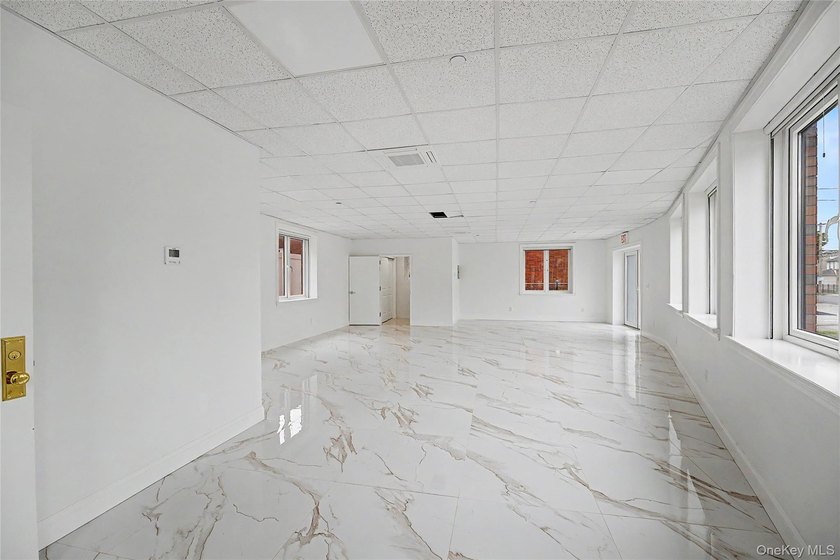 Newly renovated 2026!! Two-Family Property with Community - photo 5