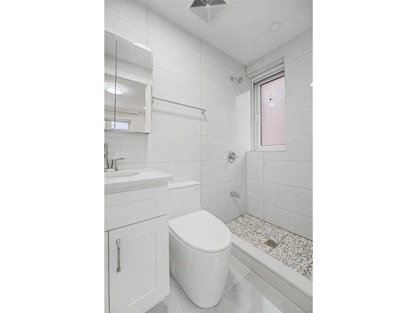 Newly renovated 2026!! Two-Family Property with Community - photo 10