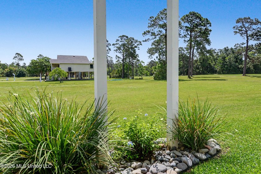 Perfectly positioned along a rare double fairway on the historic - photo 12