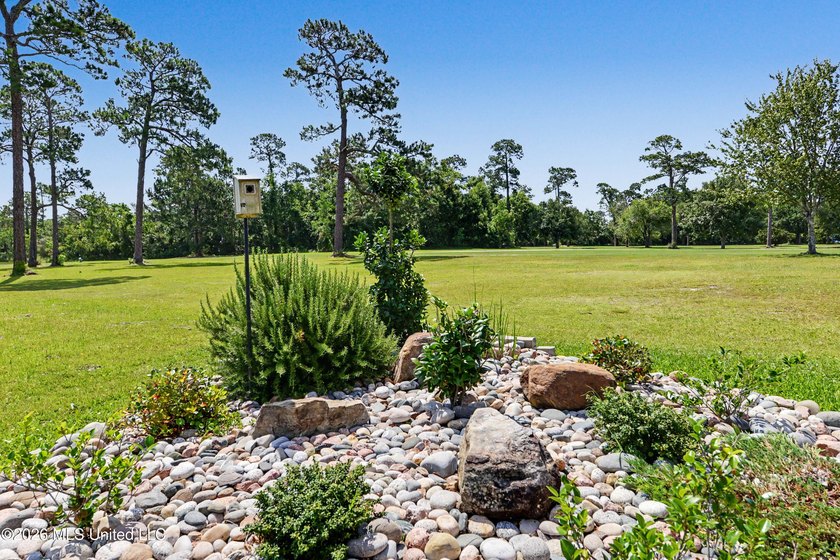 Perfectly positioned along a rare double fairway on the historic - photo 13
