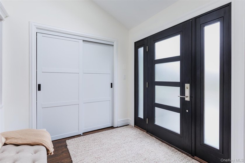Tucked away on a lush, private three-quarter acre in the highly - photo 5