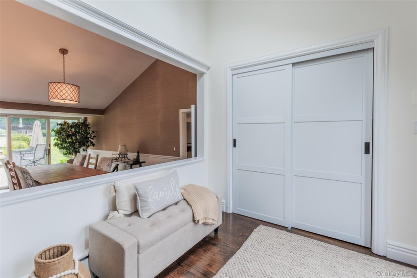 Tucked away on a lush, private three-quarter acre in the highly - photo 6