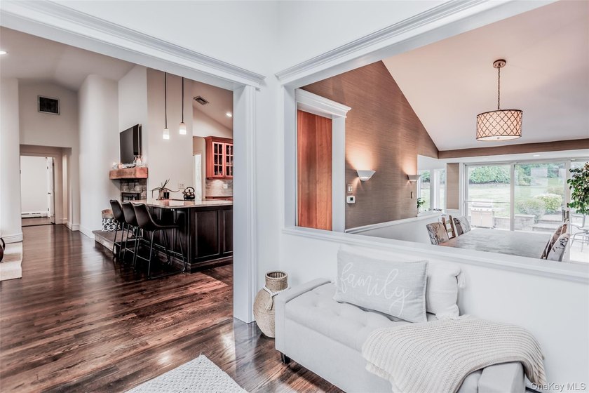 Tucked away on a lush, private three-quarter acre in the highly - photo 7