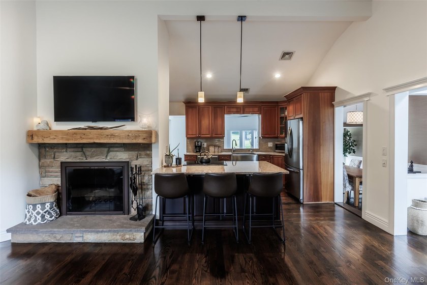 Tucked away on a lush, private three-quarter acre in the highly - photo 10