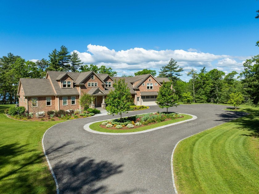 Experience unparalleled privacy in this gated, fully fenced - photo 3