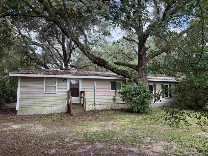 Unique investment opportunity on nearly an acre! Whether you're - photo 3