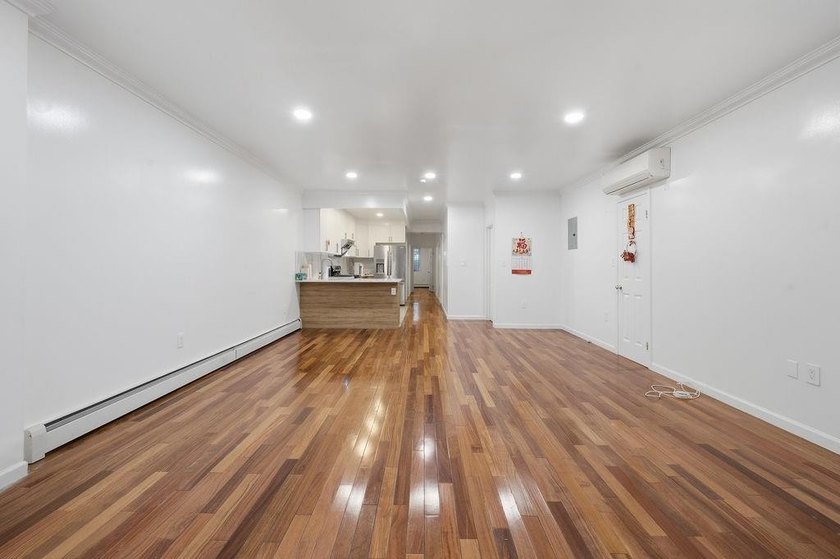Welcome to this well-maintained semi-detached 2-family home in - photo 8