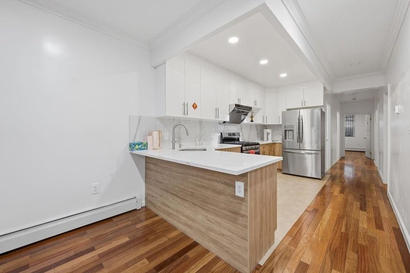 Welcome to this well-maintained semi-detached 2-family home in - photo 10