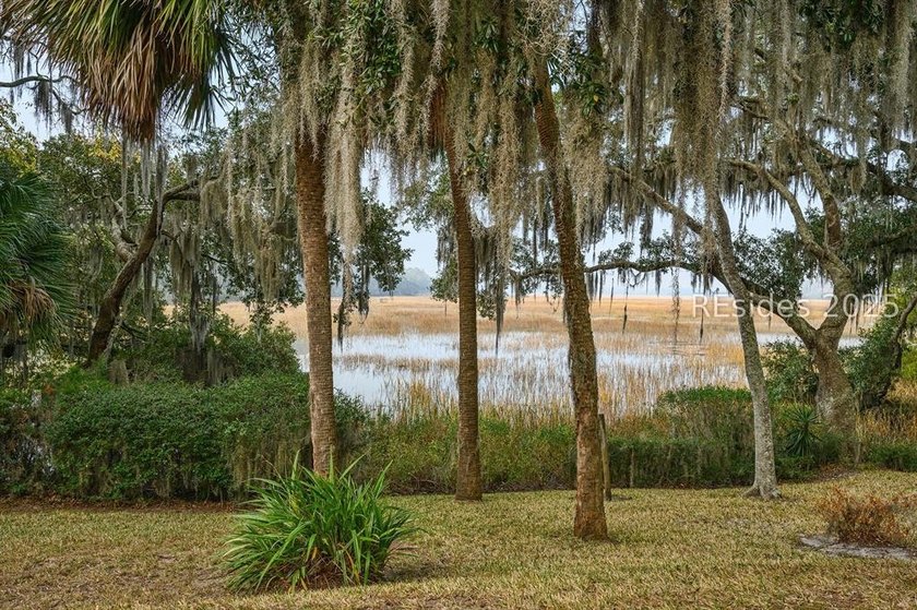 Enjoy amazing sunsets from almost every room of this marsh front - photo 8