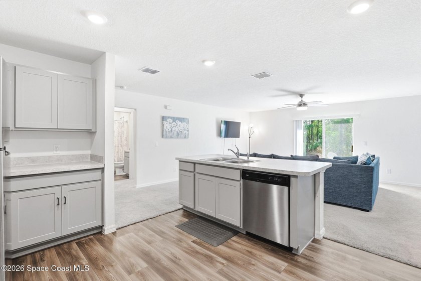Welcome home to this beautifully designed 4 bedroom, 2 bathroom - photo 11