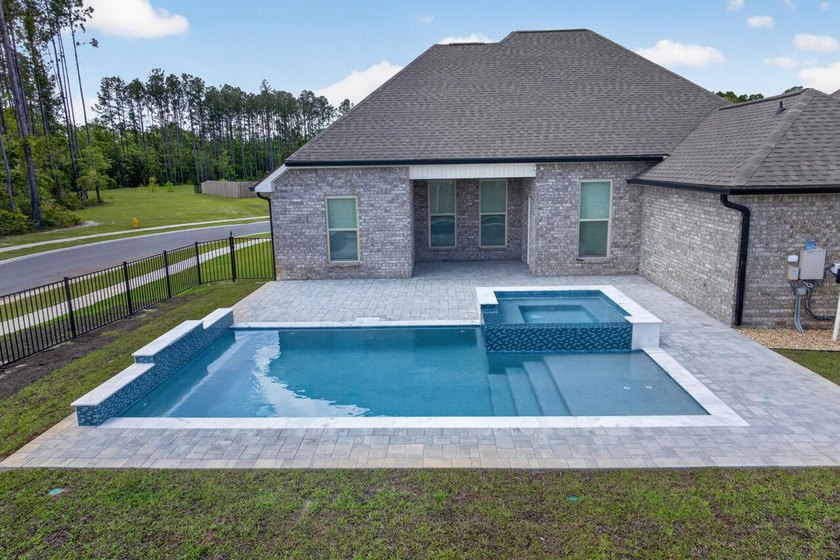 Your Florida Dream Begins Here -- Wrapped in Upgrades, Warmth - photo 4