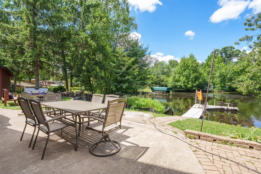 Experience the joy of lakeside living in this beautifully - photo 2