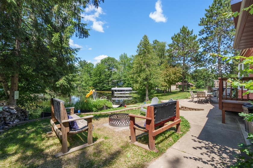 Experience the joy of lakeside living in this beautifully - photo 3