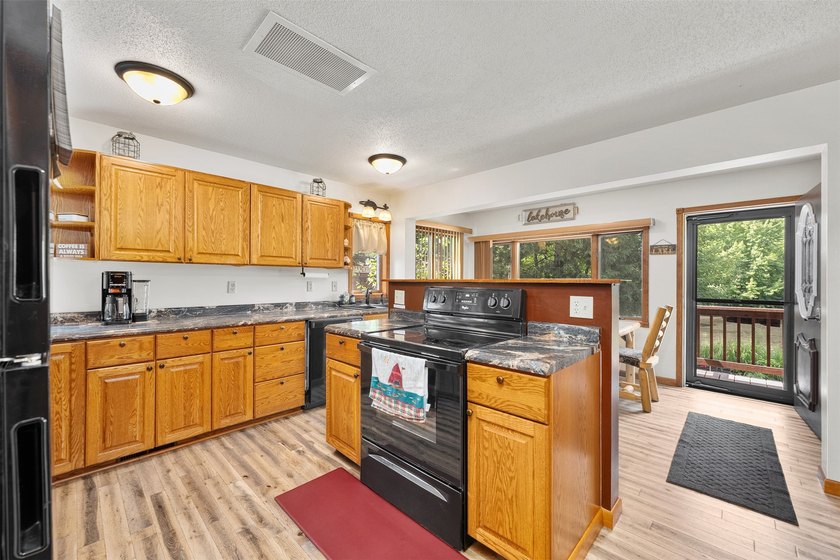 Experience the joy of lakeside living in this beautifully - photo 6