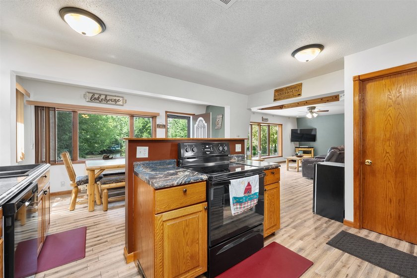 Experience the joy of lakeside living in this beautifully - photo 7