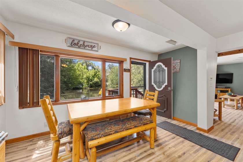 Experience the joy of lakeside living in this beautifully - photo 9