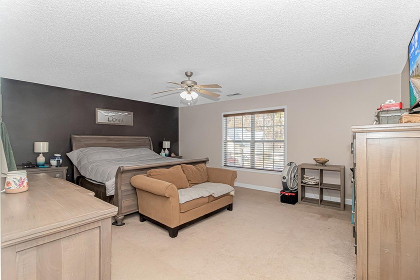 Discover this charming 4-bedroom, 2.5-bath home in the desirable - photo 9