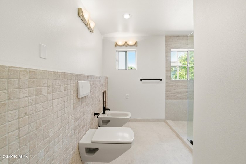 Beautifully remolded two-story home offering 4 bedrooms, 2 1/2 - photo 10