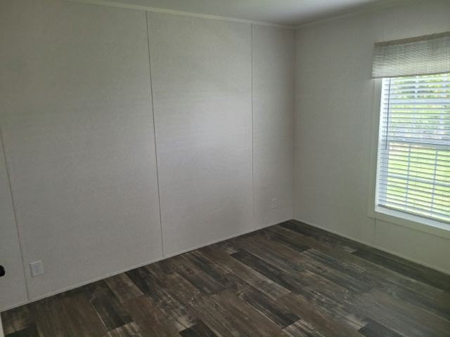 Find your place in the world at Grove Shores, a well-maintained - photo 3
