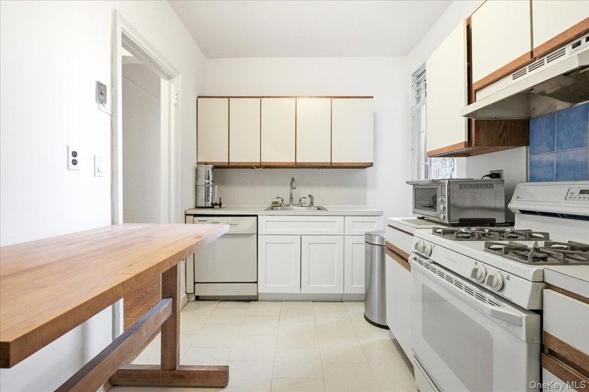 This sun-drenched one-bedroom is the kind of home that is - photo 17