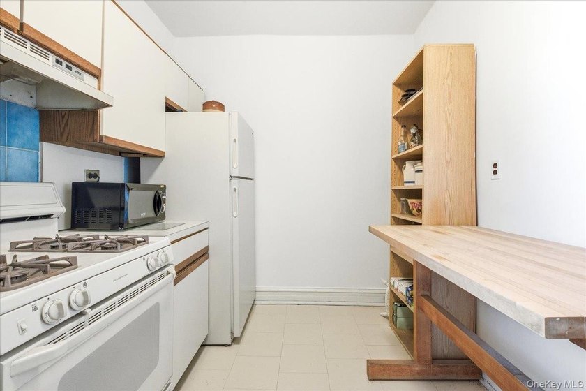 This sun-drenched one-bedroom is the kind of home that is - photo 19