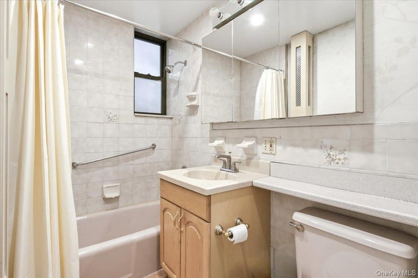 This sun-drenched one-bedroom is the kind of home that is - photo 21