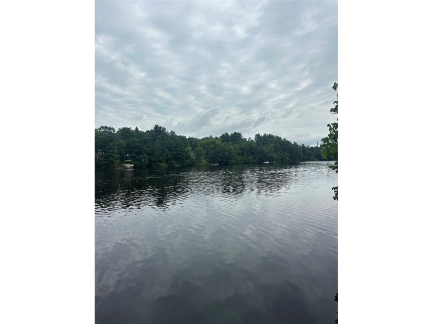 Completely Updated Riverfront Home on 1.2 Acres! Don't let the - photo 2