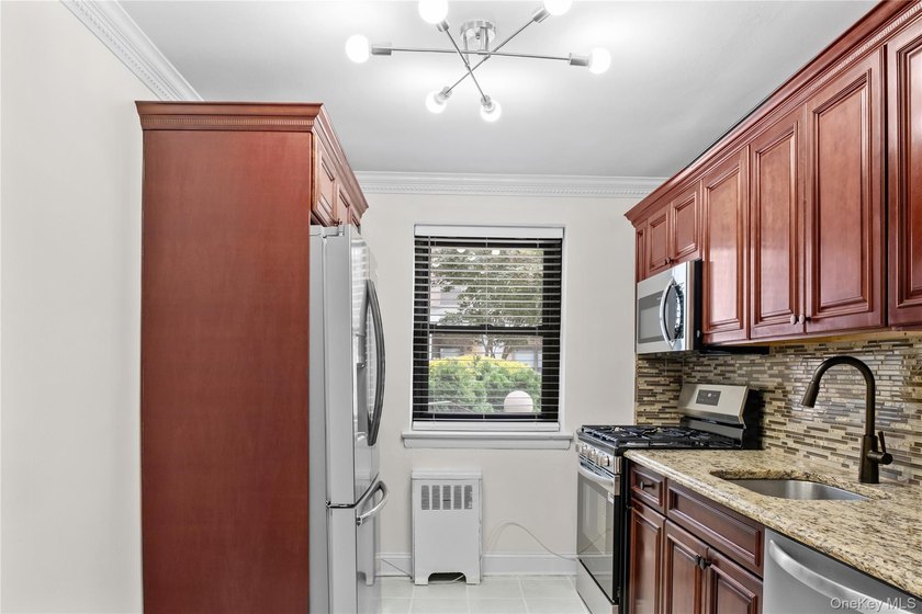 Step into this beautifully renovated 1-bedroom home and enjoy - photo 3