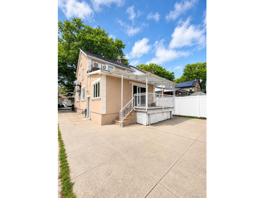 Welcome to this charming single-family home featuring a spacious - photo 4
