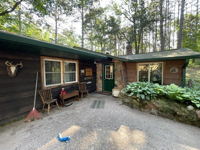 Escape to the Northwoods with this charming 2-bedroom, 1-bath - photo 2