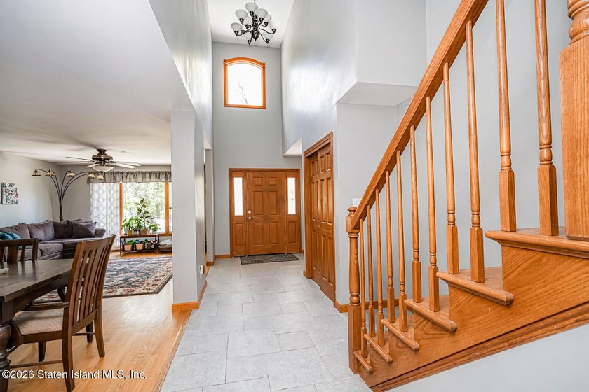 Welcome to this stunning 2-family colonial tucked away on a - photo 5
