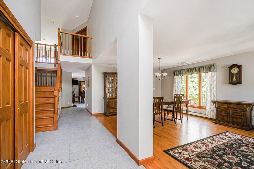 Welcome to this stunning 2-family colonial tucked away on a - photo 6