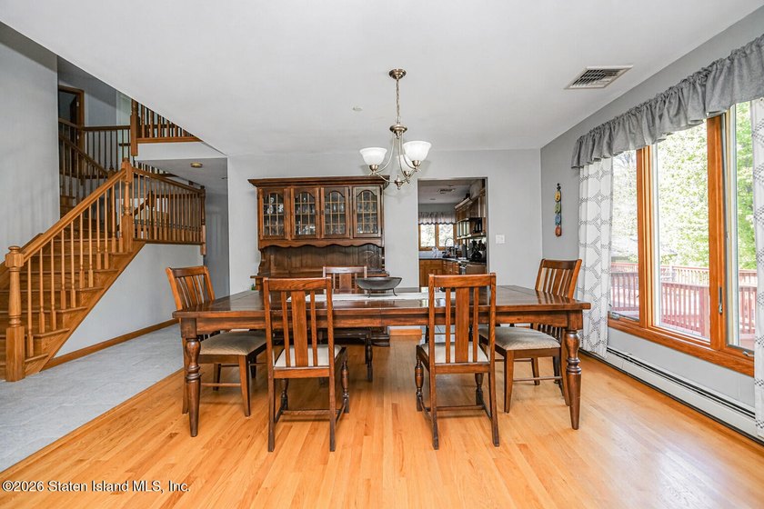 Welcome to this stunning 2-family colonial tucked away on a - photo 9