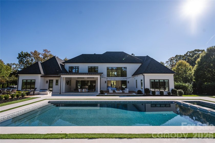 Designed to bring people together, this exceptional custom home - photo 3