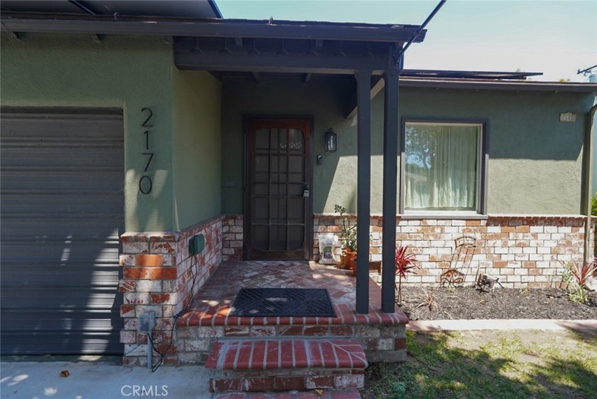 Welcome to this charming 2-bedroom, 1-bath home nestled in the - photo 3