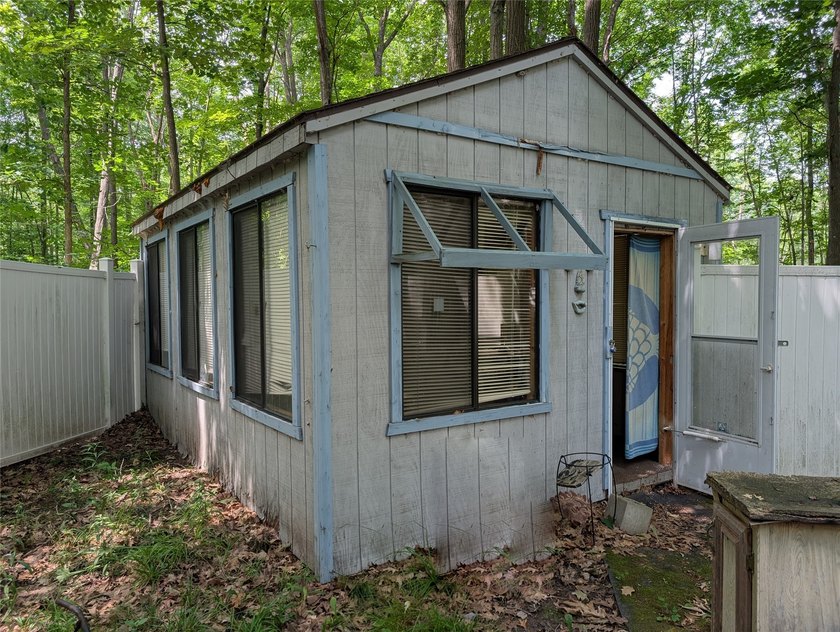 Tucked into the trees just outside Ladysmith, this .92-acre - photo 3