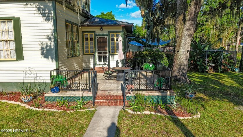 This home offers the best of both worlds, historic character - photo 4