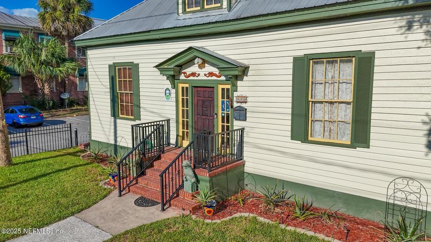 This home offers the best of both worlds, historic character - photo 5