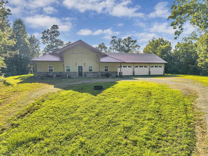 This Arkansas River Valley retreat is situated on 4.59 private - photo 3
