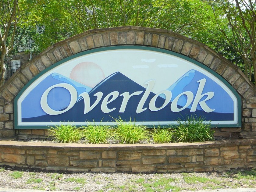 Discover an unparalleled lifestyle at Overlook Condominiums, a - photo 2