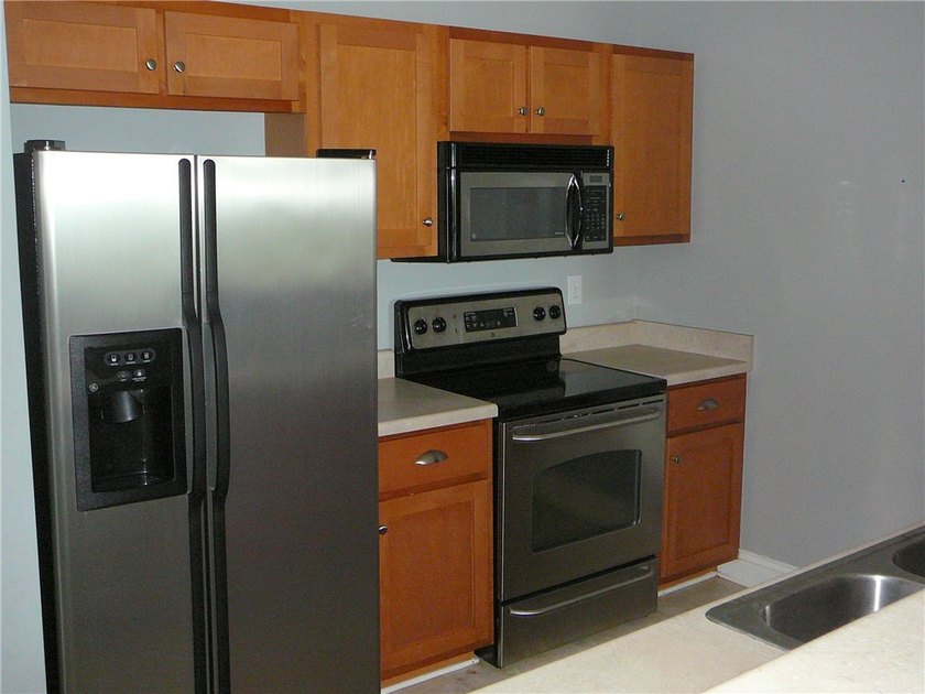 Discover an unparalleled lifestyle at Overlook Condominiums, a - photo 7