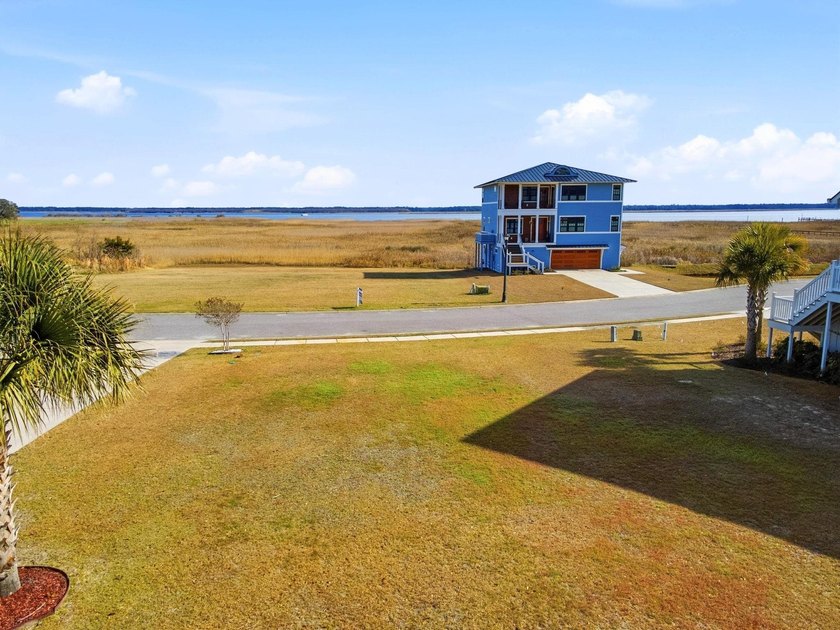 Panoramic views of Winyah Bay await you in this gorgeous *to be - photo 5