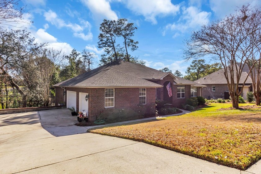 This lovely home sits on a corner lot on a cul-de-sac that - photo 3