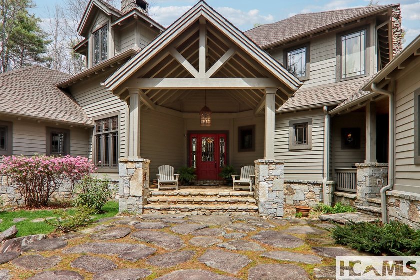 Discover a remarkable residence that embodies timeless mountain - photo 6