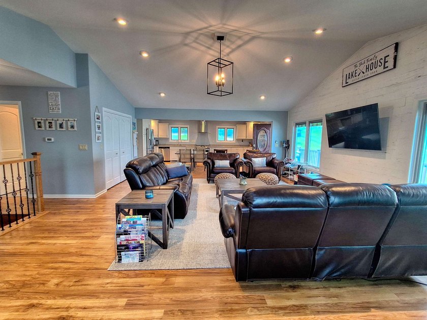 Lake life just got an upgrade. This remodeled waterfront home at - photo 8