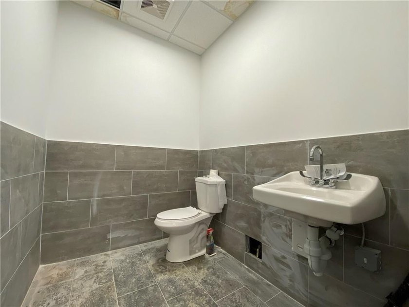 Welcome to 1374 65th Street, a brand-new commercial building in - photo 9