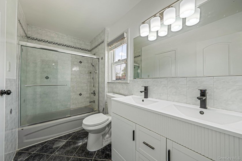 Welcome to this stunning Colonial nestled in the heart of - photo 12
